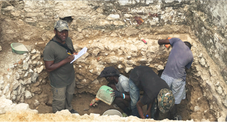 Anthropology PhD student Camille Louis and Haitian students excavating the royal palace of Henry Christophe, Milot, Haiti [Photo by J. Cameron Monroe]
