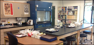 lab space with desks, samples in bags